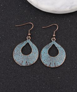 White bead hanging hollow butterfly earrings